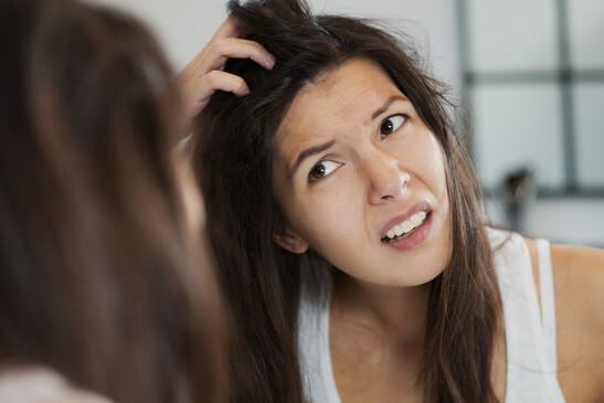 girl worrying about her hair